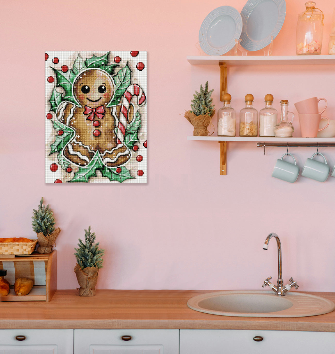 Weihnachtliches Diamond Painting mit Lebkuchenmann, Zuckerstange, grünen Blättern und roten Beeren als festliche Wanddekoration