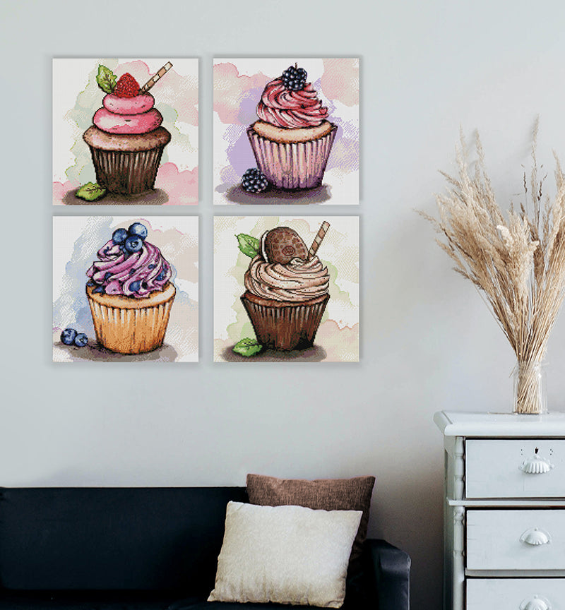 Vier Cupcake Diamond Paintings ander Wand