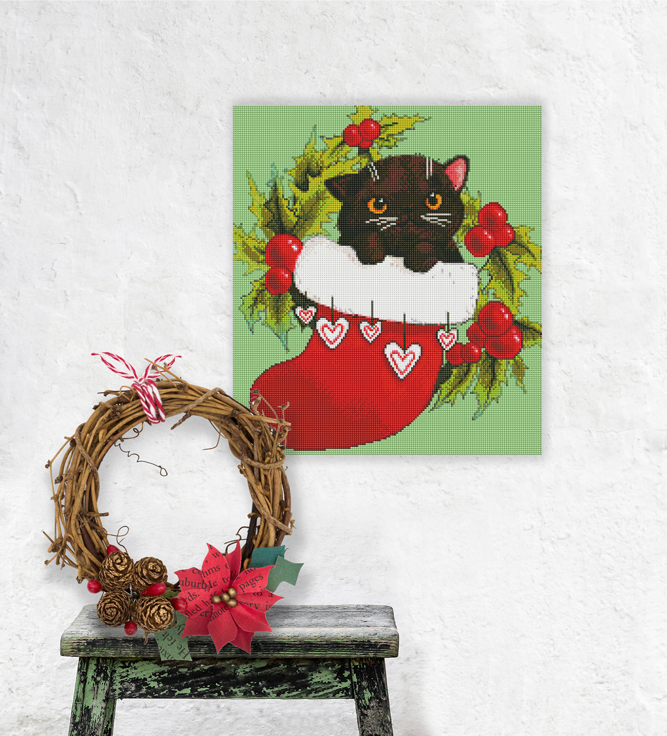 Niedliches Diamond Painting mit schwarzem Kätzchen im Weihnachtsstrumpf als festliche Wanddekoration